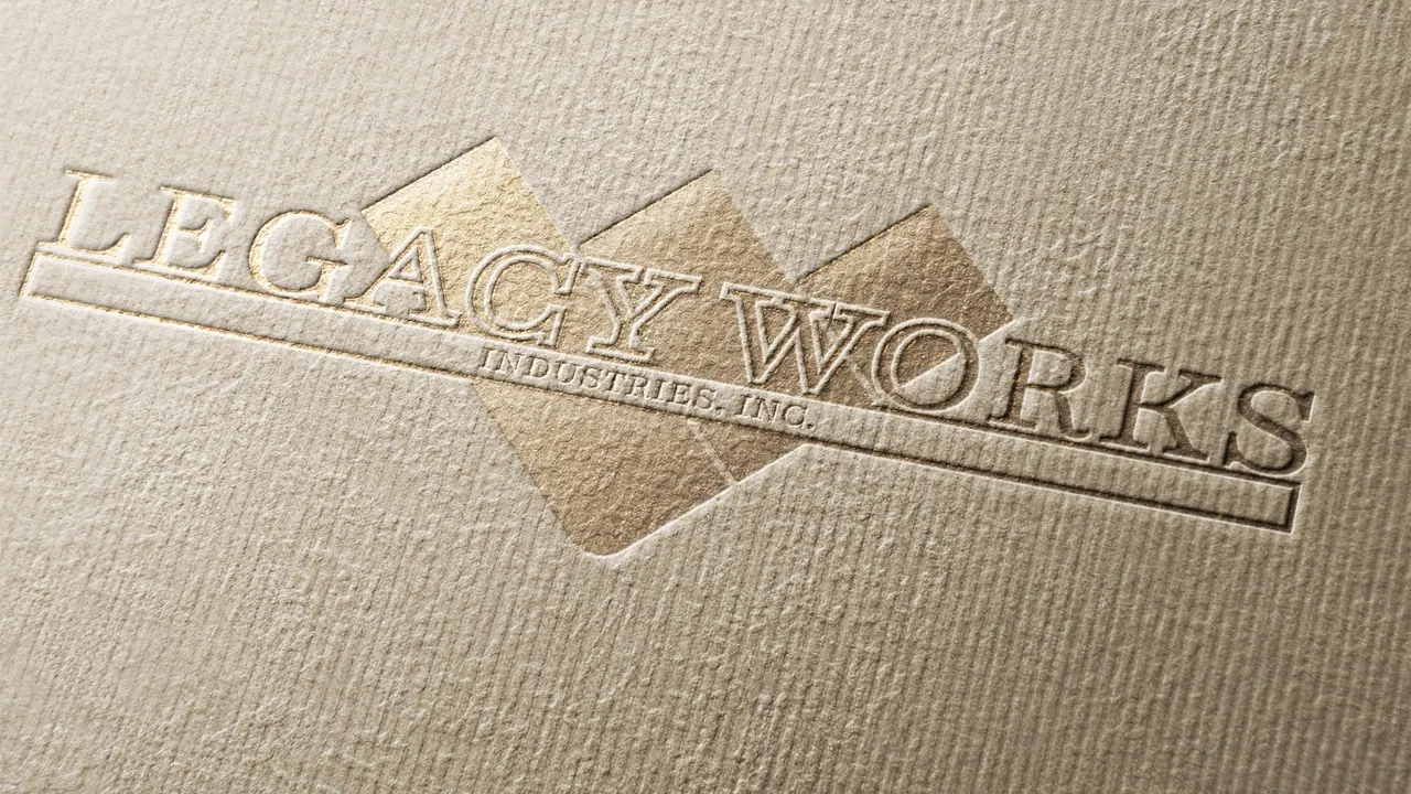 The Legacy Works Industries wordmark blind-embossed and foiled on textured paper.