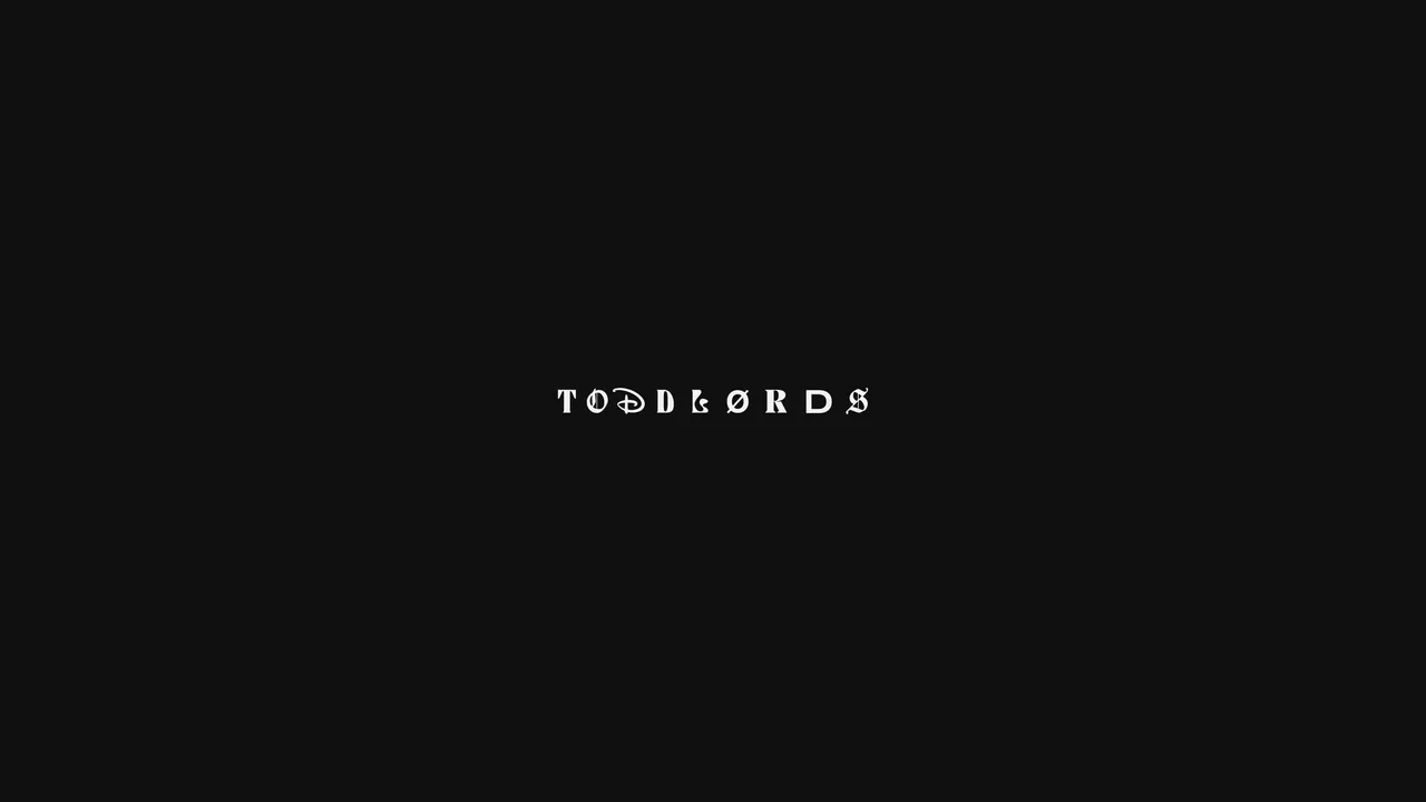 The Toddlords wordmark, small and white, on black.